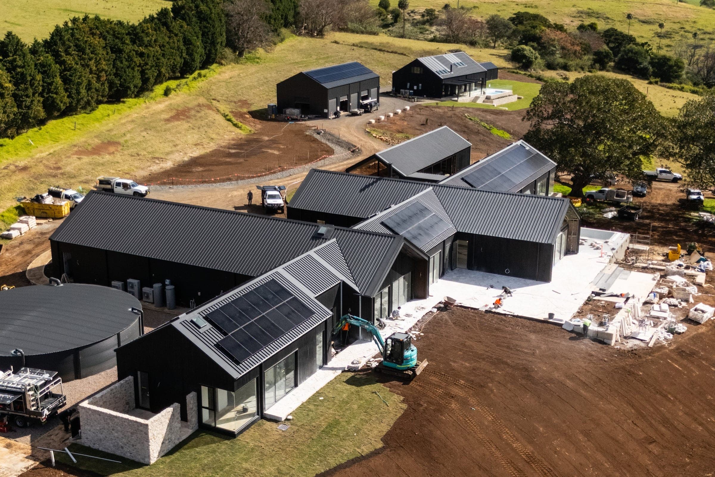 Aerial view of the Halls Road pavilions and earthworks, with the escarpment behind