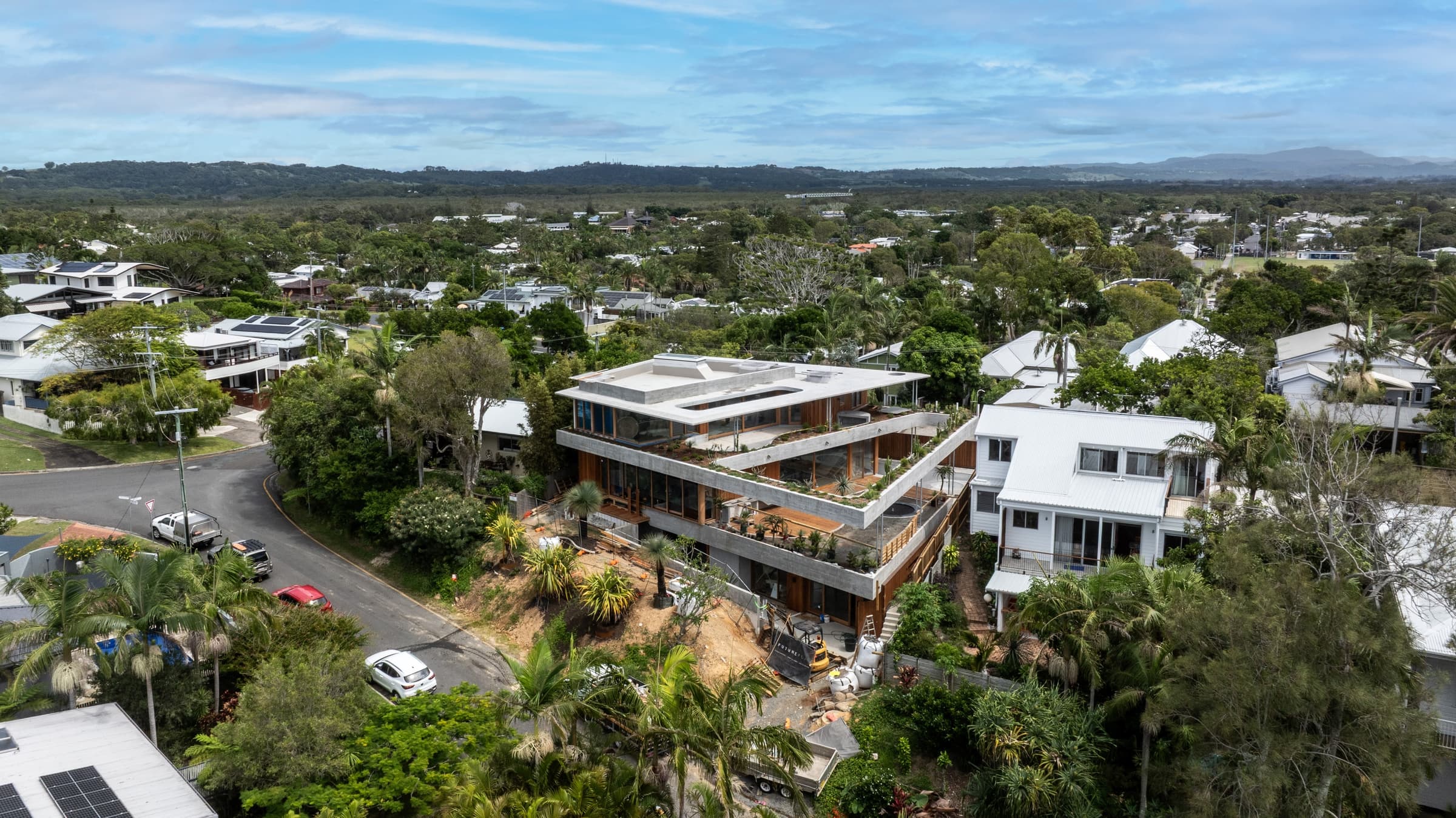 Aerial view of Paterson's dual-frontage site between street and rear lane in Byron Bay